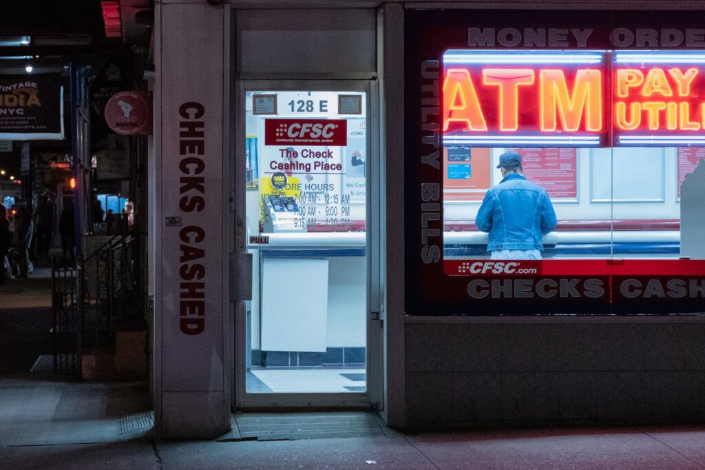 atm booth with neon signage